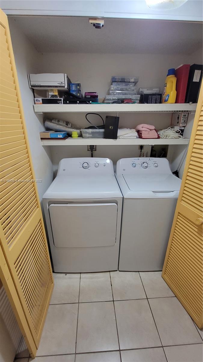 Kendall Miami, FL 33176 - Photo 13 of 15 a utility room with dryer and washer