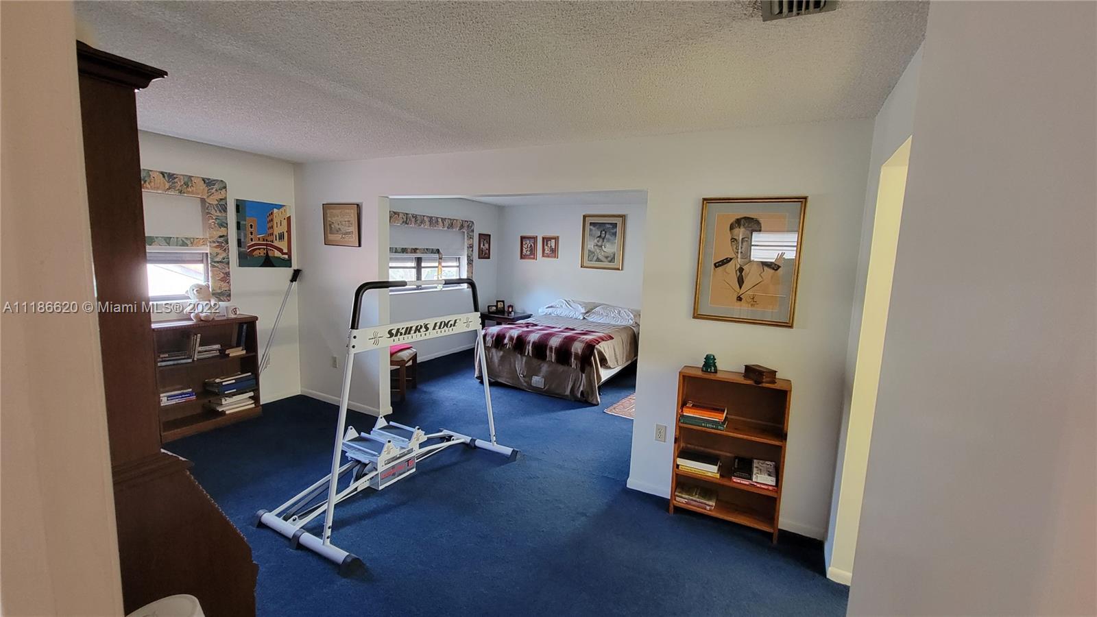 Kendall Miami, FL 33176 - Photo 14 of 15 a bedroom with bed and a view of bathroom