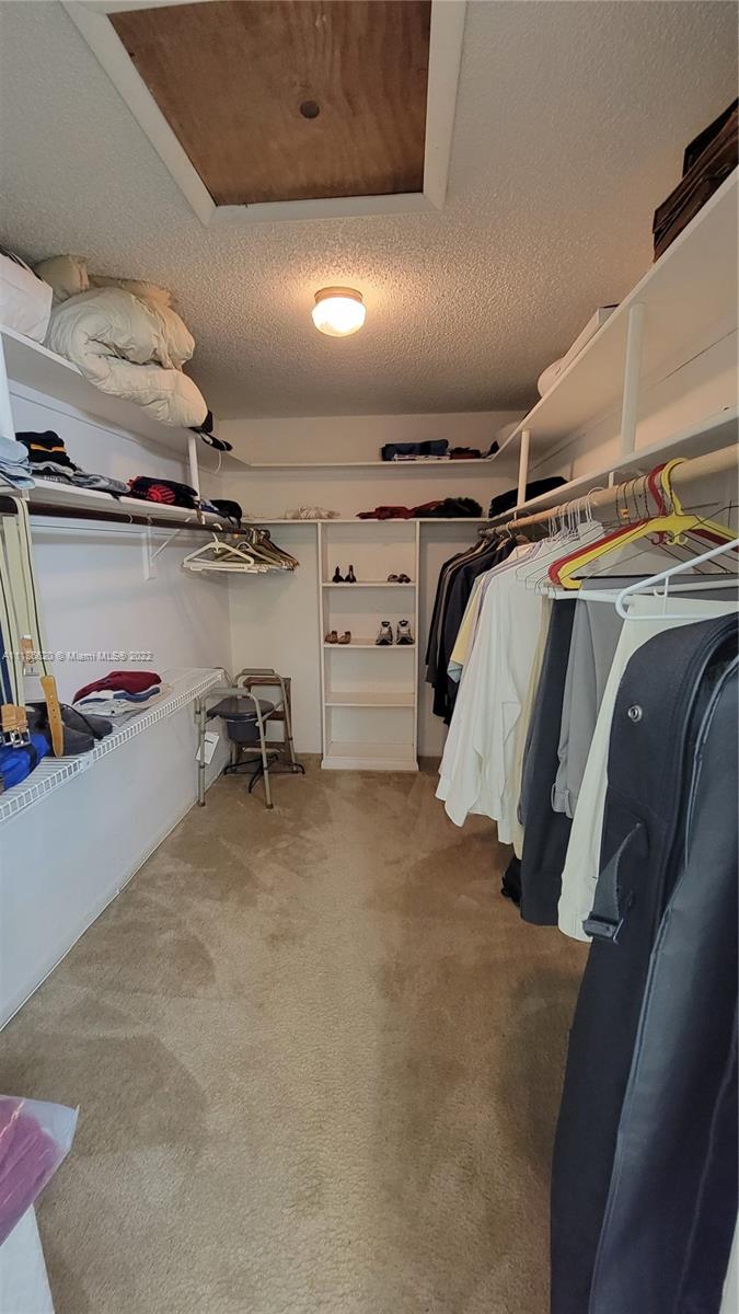 Kendall Miami, FL 33176 - Photo 15 of 15 a view of walk in closet with clothes and shoes