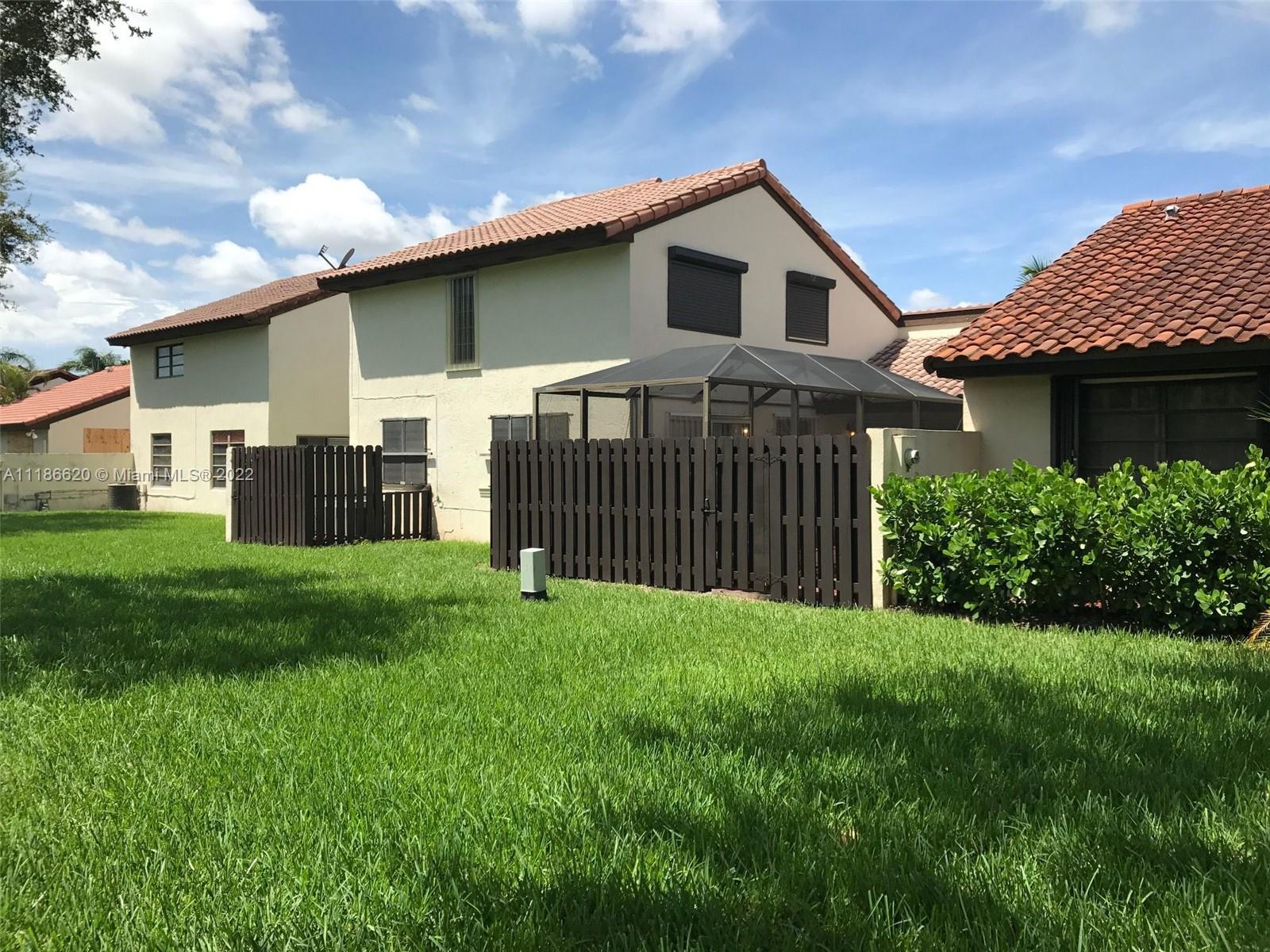 Kendall Miami, FL 33176 - Photo 2 of 15 a front view of a house with a yard