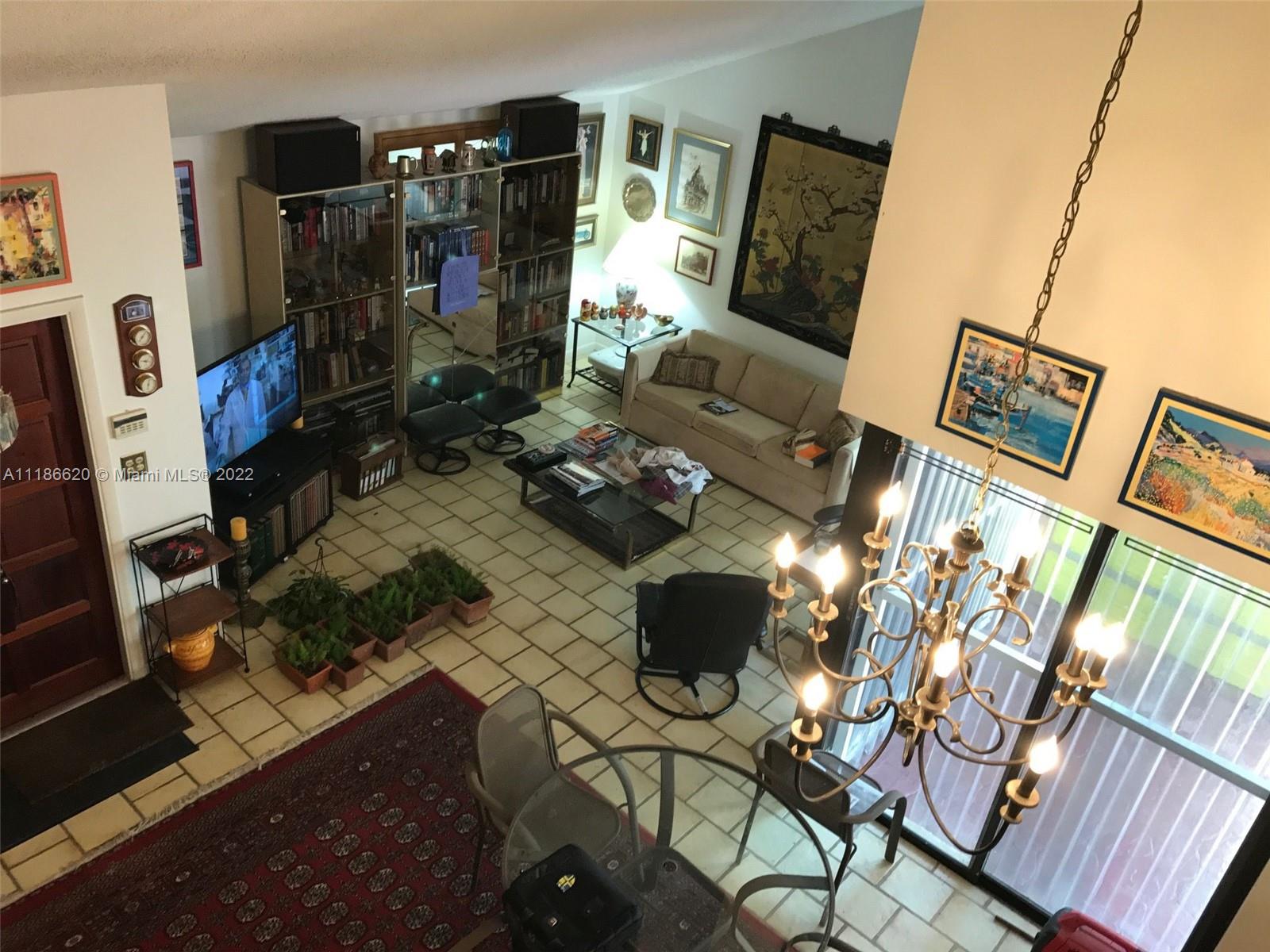 Kendall Miami, FL 33176 - Photo 10 of 15 a living room with furniture and a flat screen tv