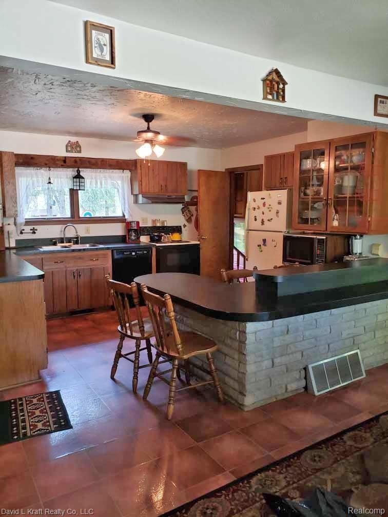 4357 Cochran Road Caseville, MI 48725 - Photo 12 of 23 4357CochranKitchen.jpg