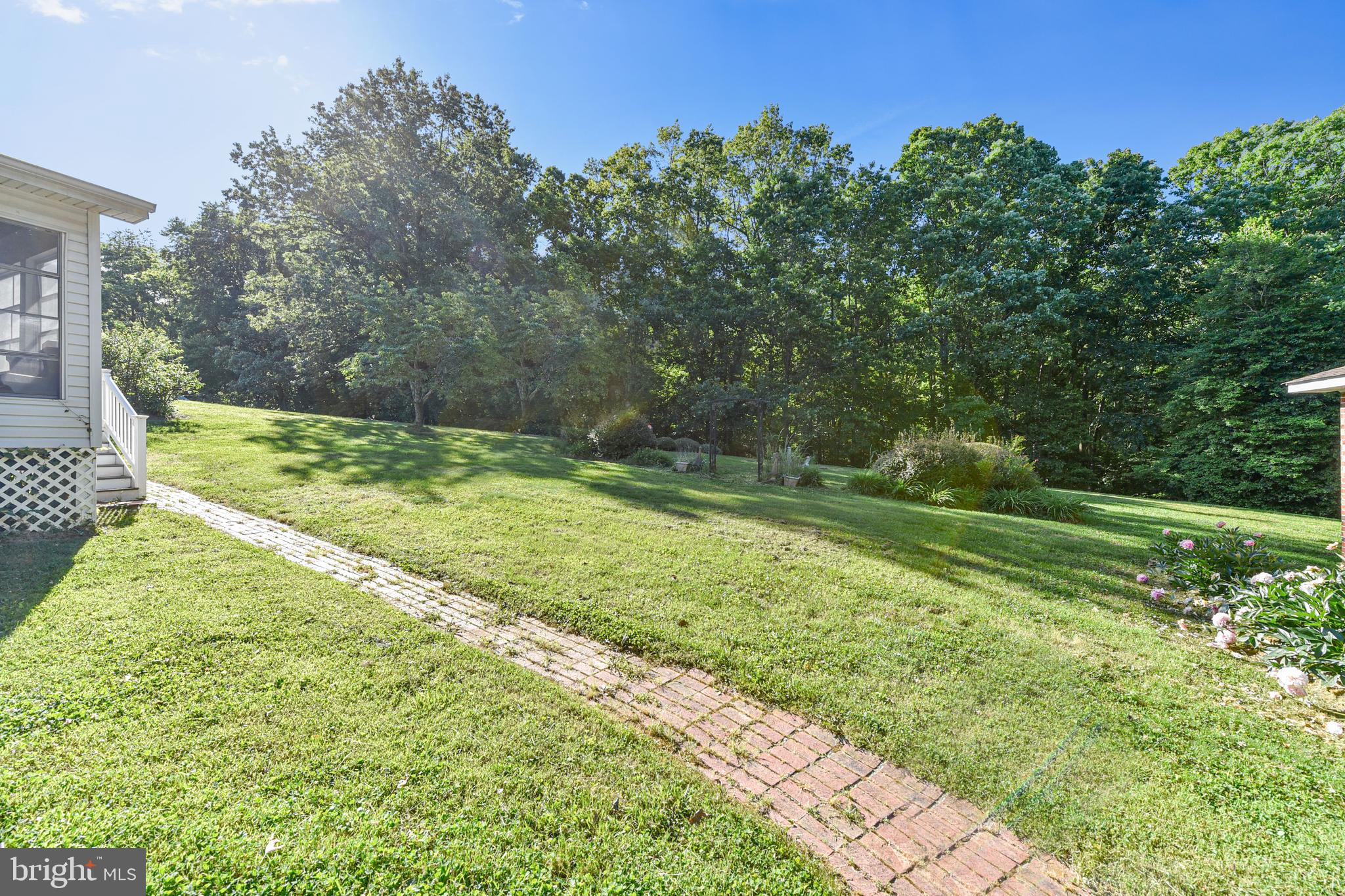 7824 Signal Hill Road Manassas, VA 20111 - Photo 26 of 45 Walk way to sun room