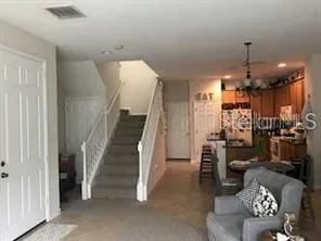 a view of a livingroom with furniture and a living room