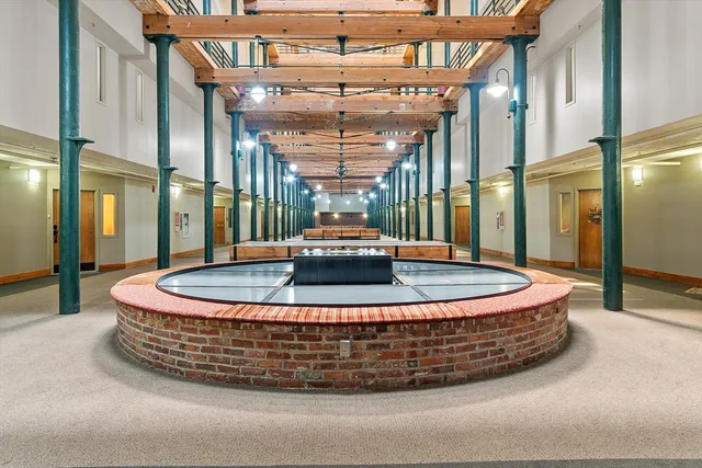 a large room with a fountain