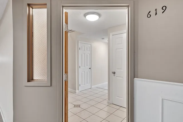 a view of a bathroom from a hallway