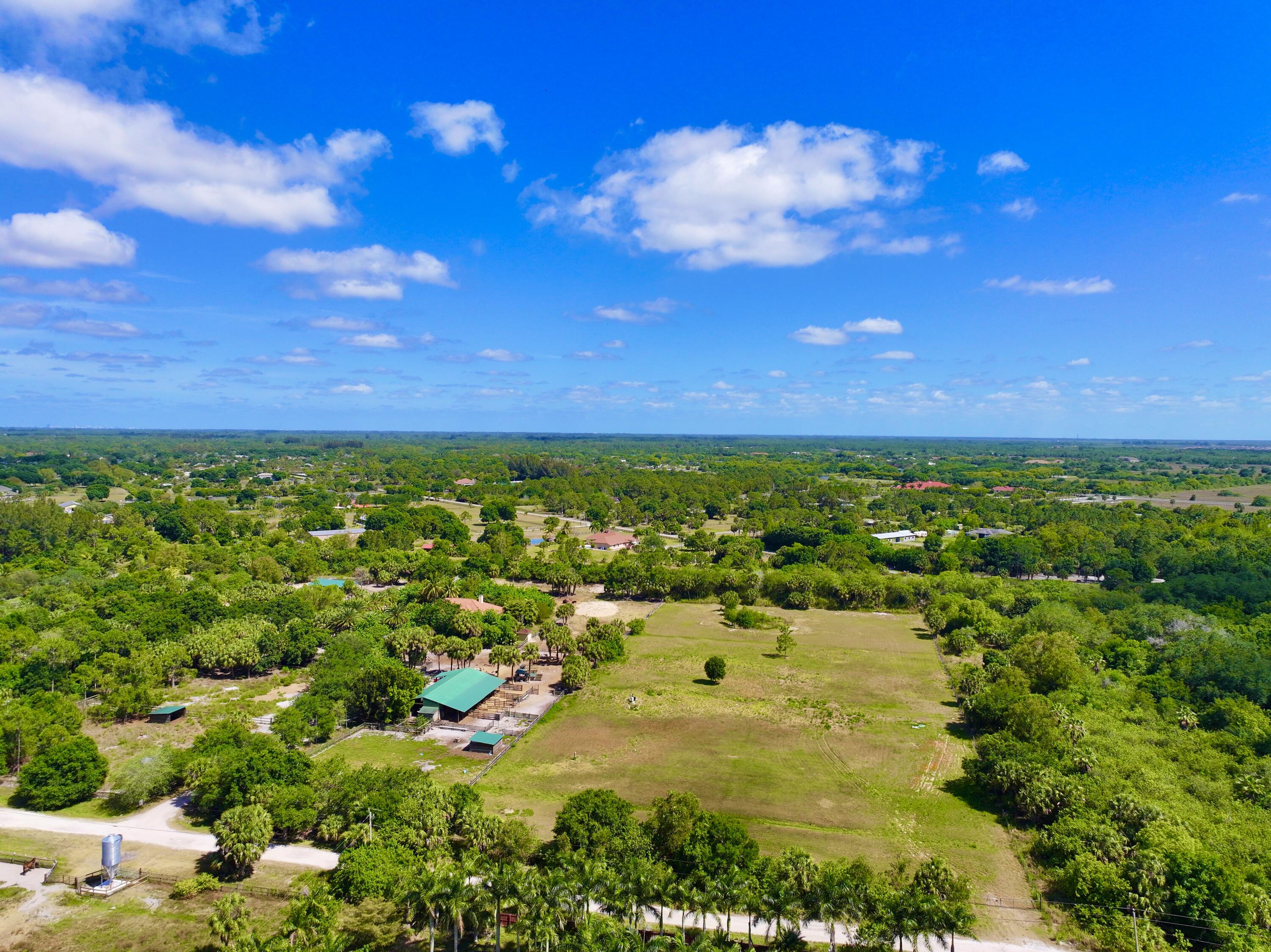 4088 Windmill Road Loxahatchee, FL 33470 - Photo 1 of 44 dji_fly_20240417_154618_0033_17132959393