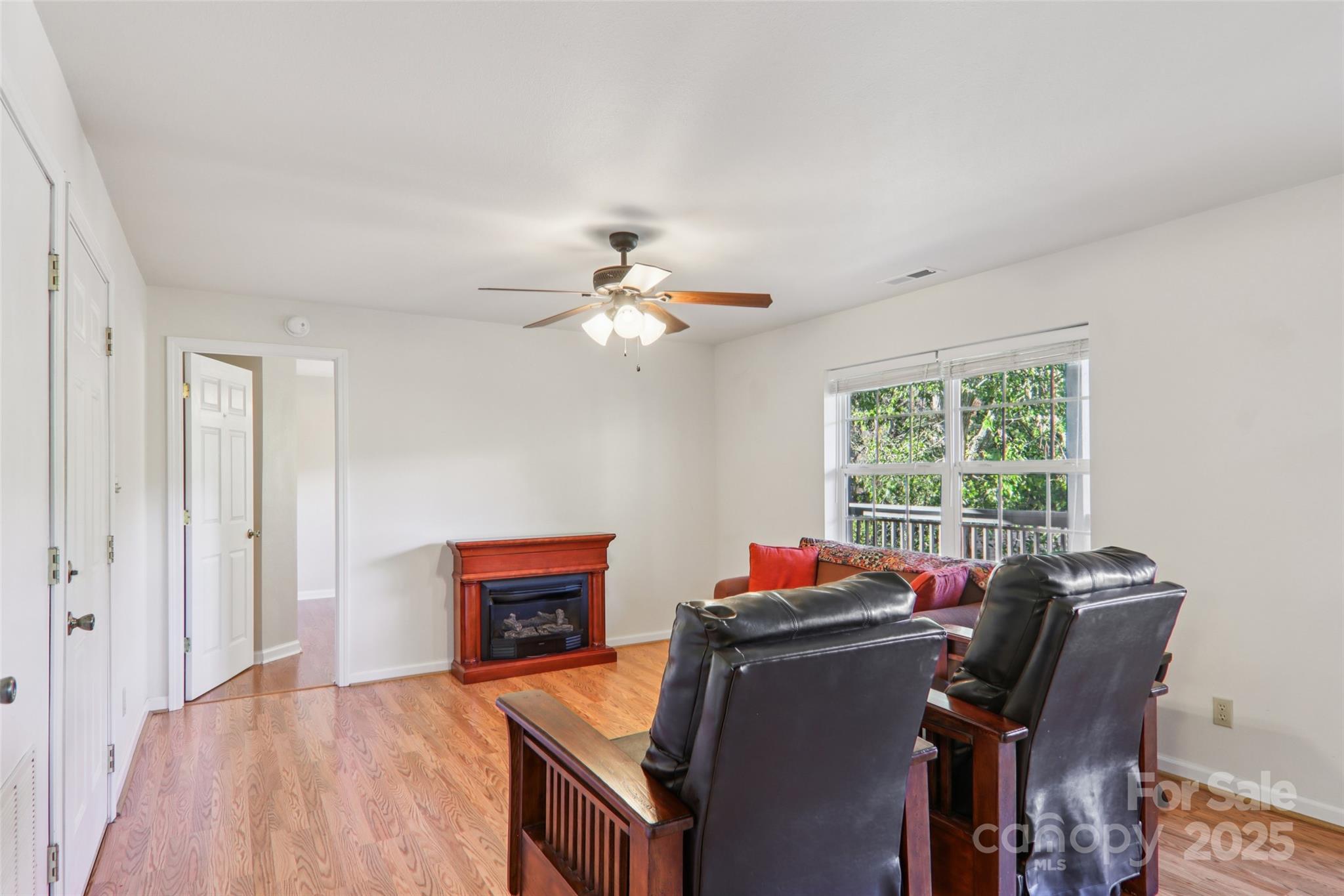 166 Linsonwood Ridge Waynesville, NC 28786 - Photo 19 of 39 a view of a dining room with furniture and a chandelier
