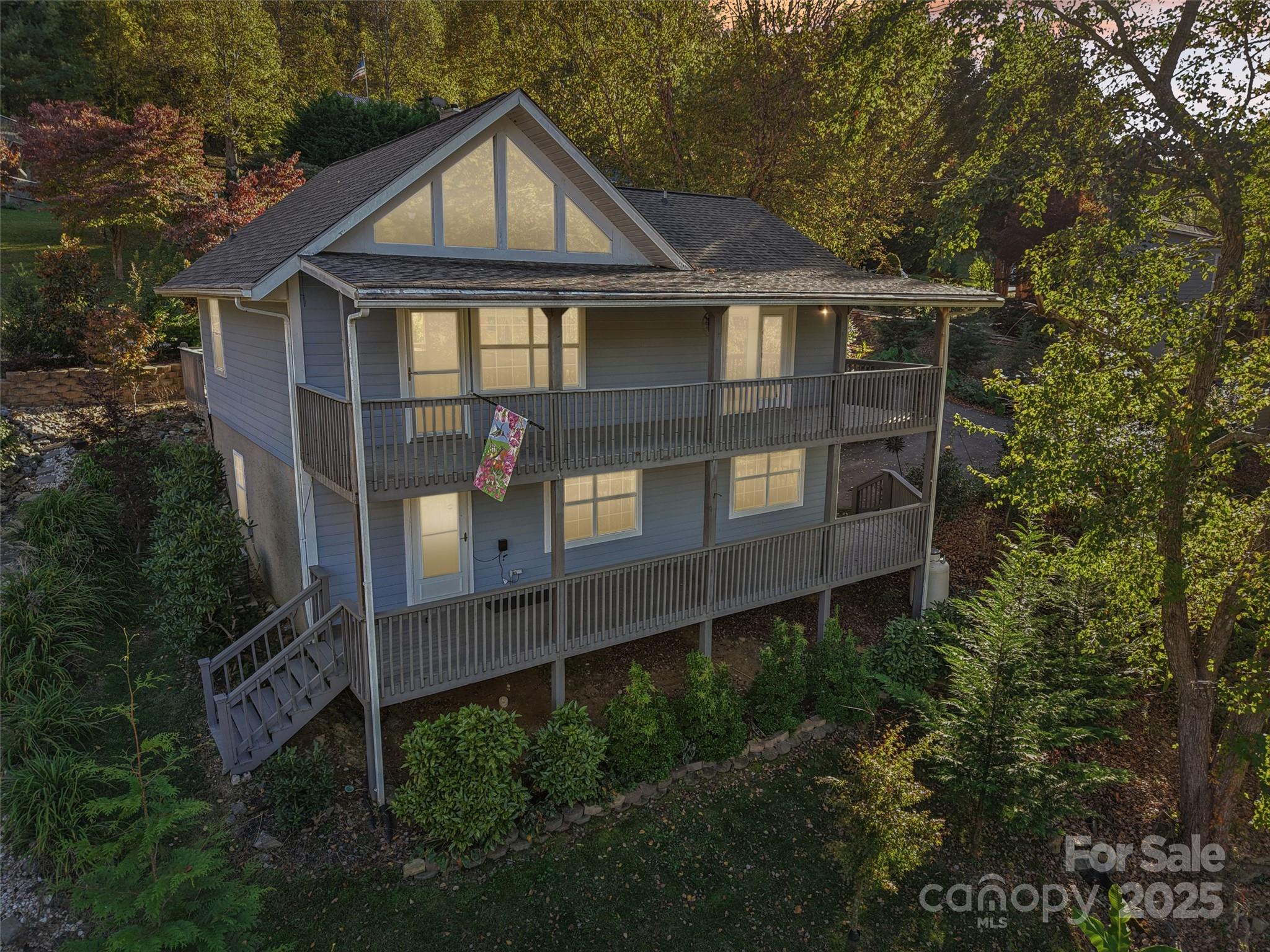 166 Linsonwood Ridge Waynesville, NC 28786 - Photo 2 of 39 a front view of a house with balcony