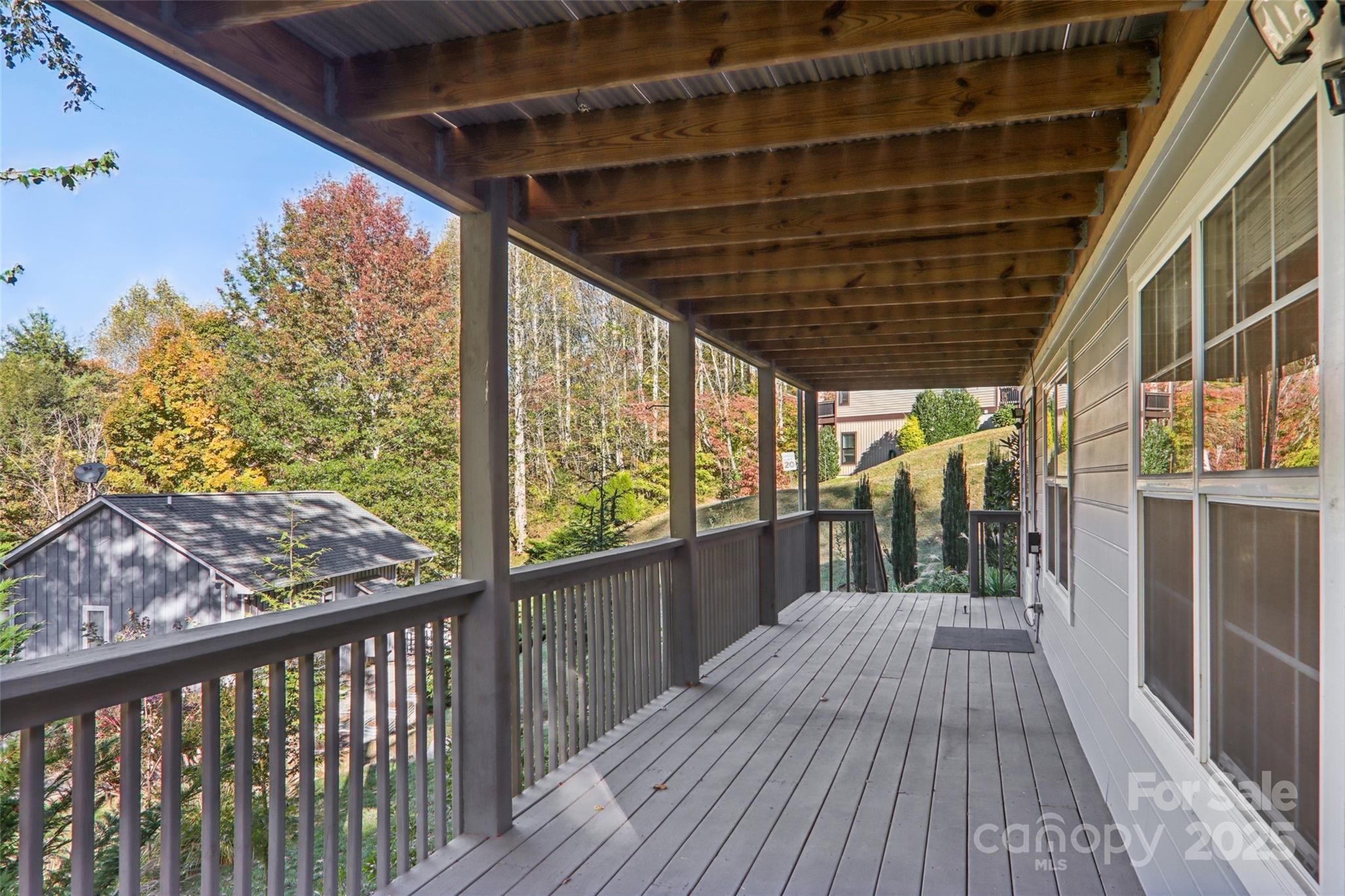 166 Linsonwood Ridge Waynesville, NC 28786 - Photo 34 of 39 a view of a balcony with wooden floor