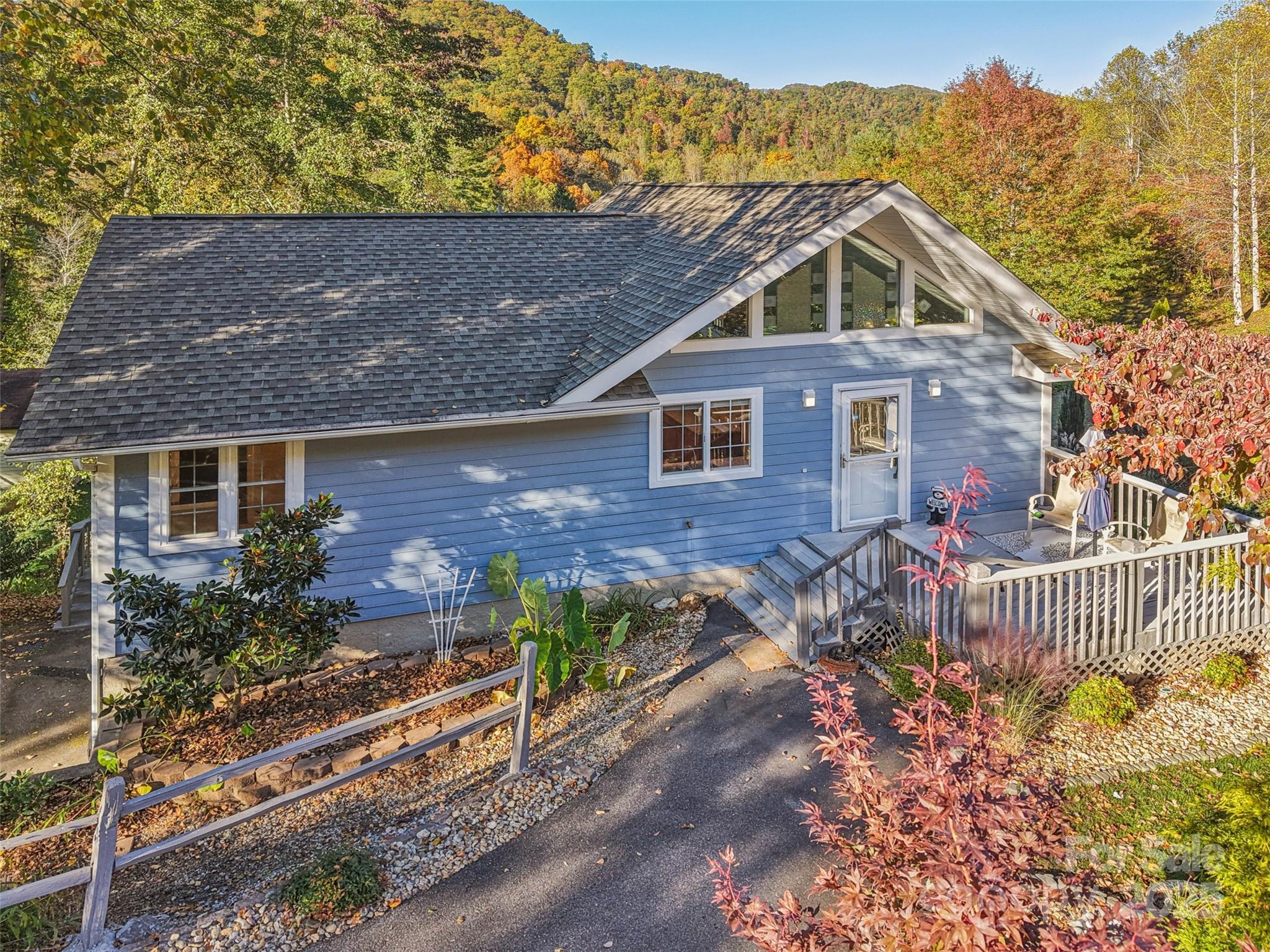 166 Linsonwood Ridge Waynesville, NC 28786 - Photo 36 of 39 a front view of a house with a yard