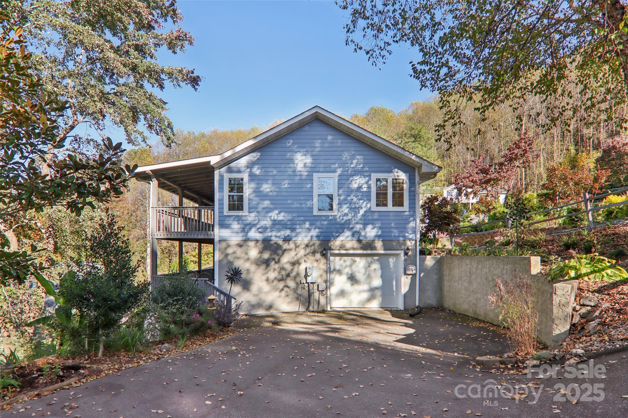 166 Linsonwood Ridge Waynesville, NC 28786 - Photo 39 of 39 a view of a house with a yard and large tree
