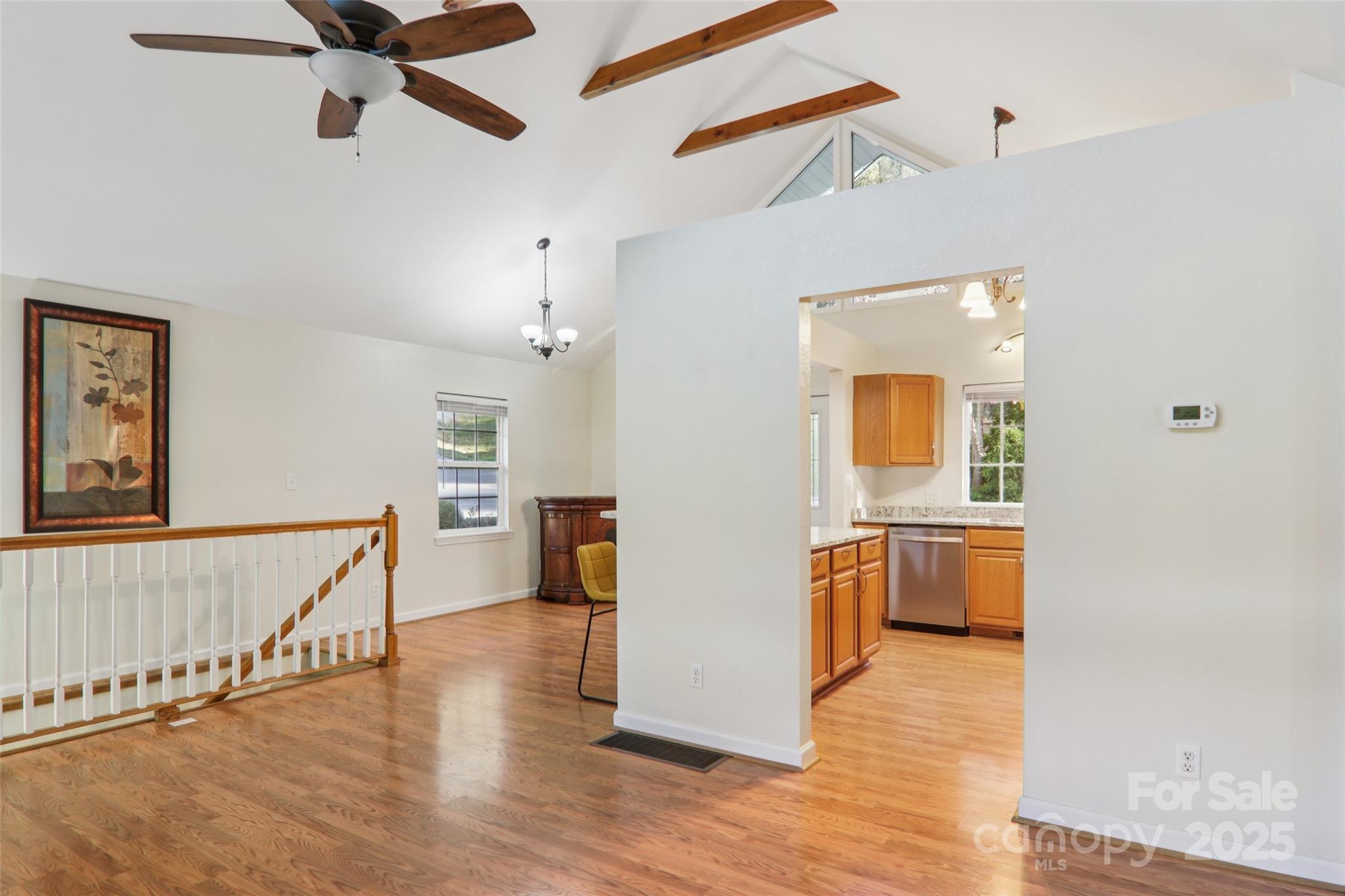 166 Linsonwood Ridge Waynesville, NC 28786 - Photo 7 of 39 a view of a kitchen with a sink cabinets and wooden floor