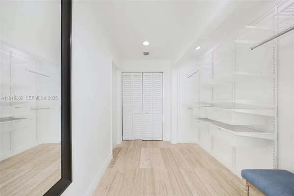 a view of a terrace with outdoor seating and ocean view