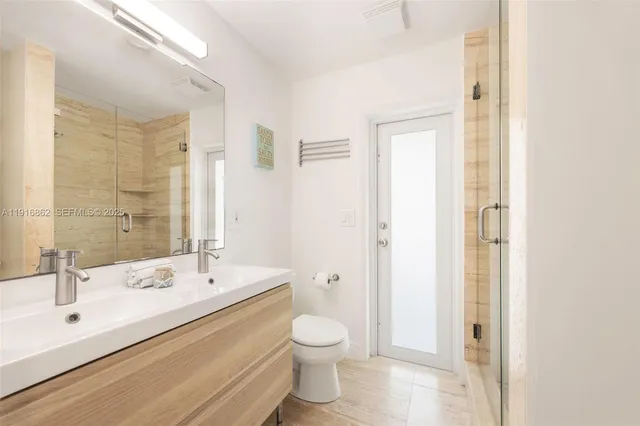 a building outdoor space with patio furniture and potted plants