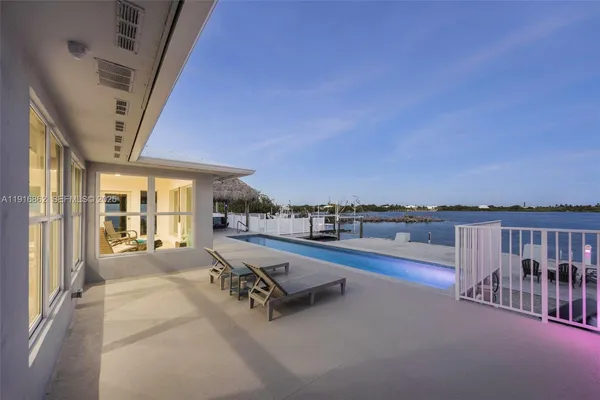 a view of an empty room with a fireplace