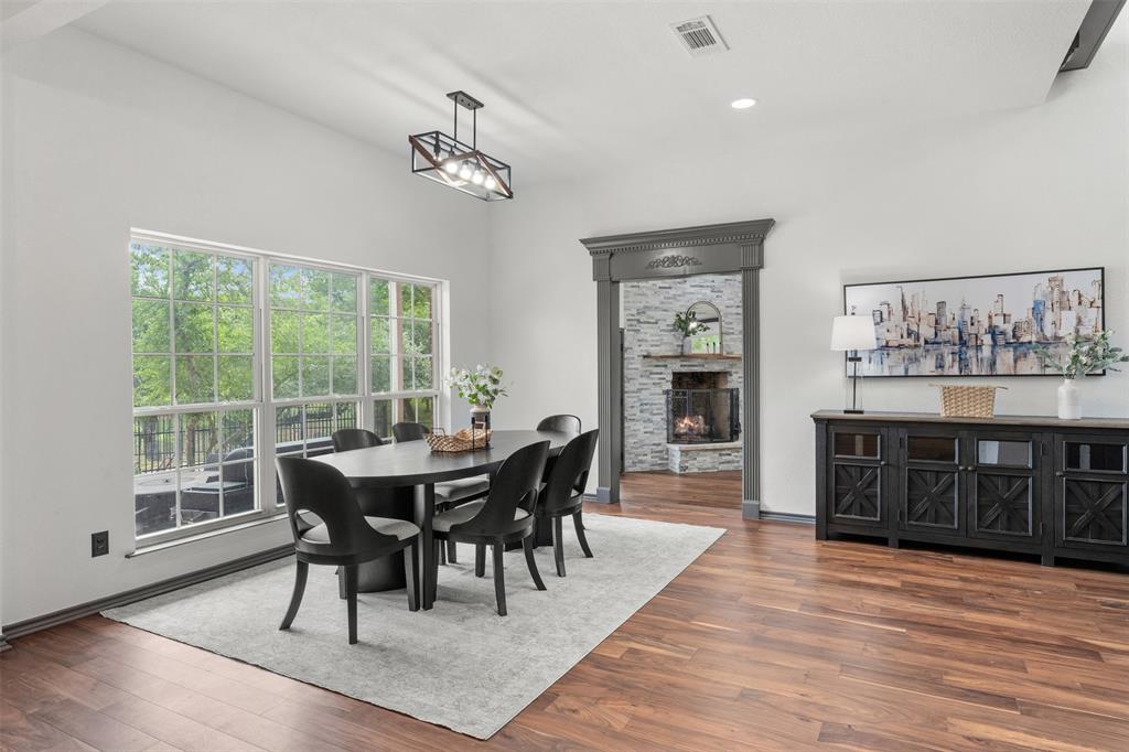 3091 Rockbridge Road McGregor, TX 76657 - Photo 10 of 40 a view of a dining room with furniture window and wooden floor