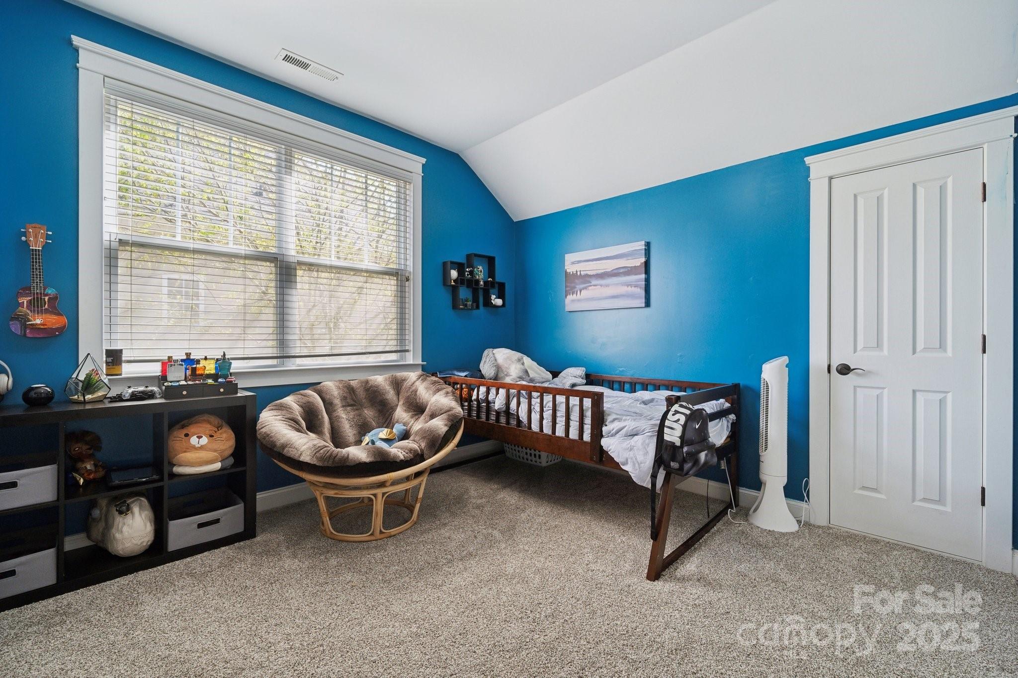369 Shoreline Parkway Tega Cay, SC 29708 - Photo 22 of 40 a living room with furniture and a window