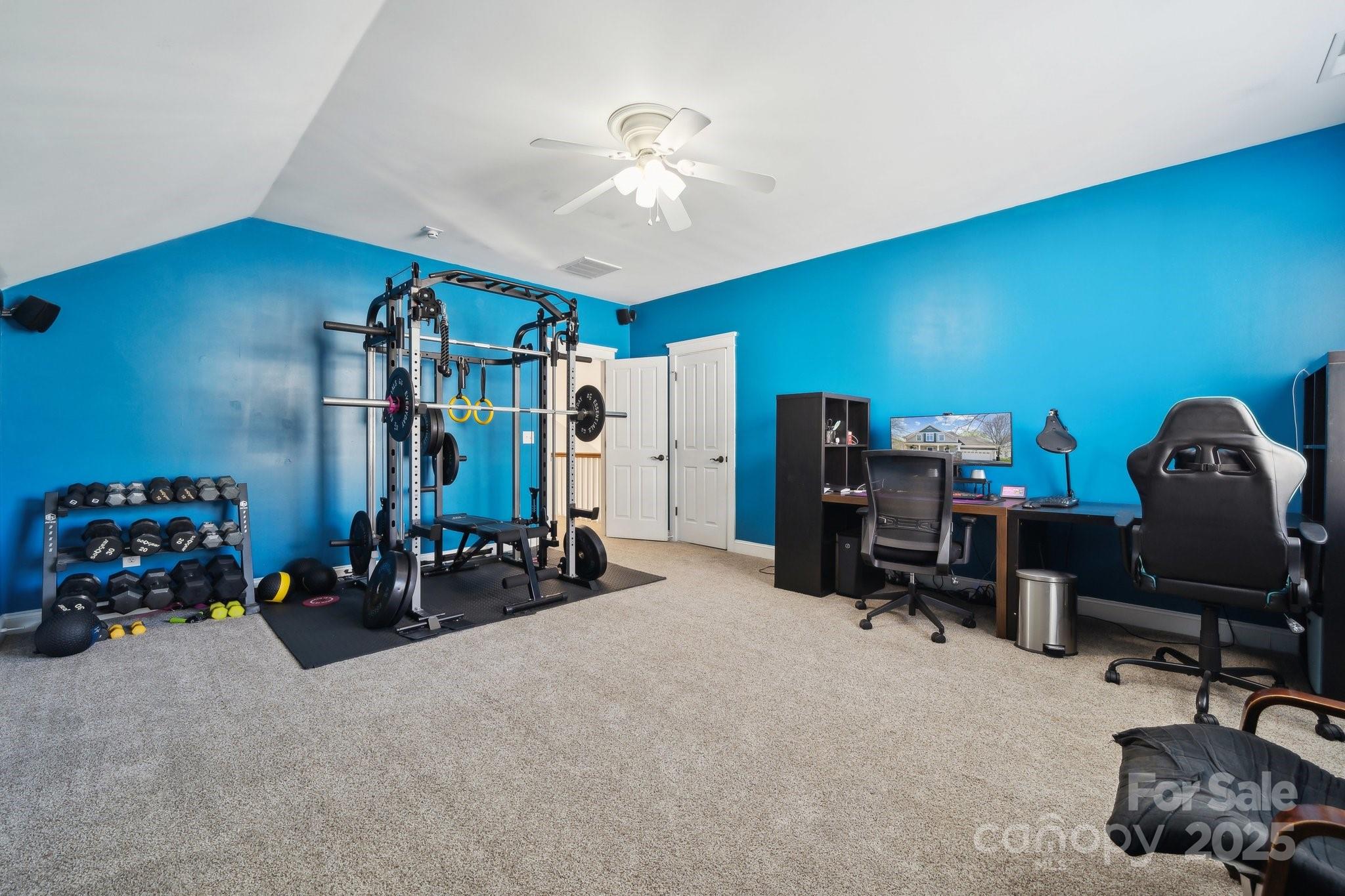 369 Shoreline Parkway Tega Cay, SC 29708 - Photo 27 of 40 a view of a room with gym equipment