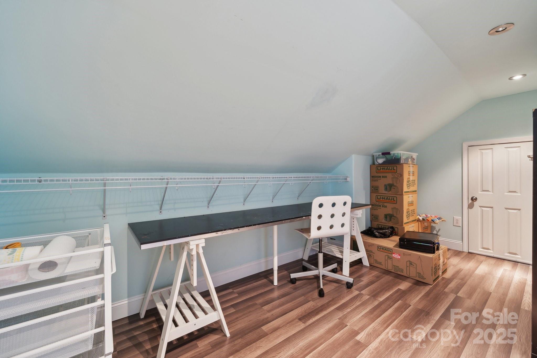 369 Shoreline Parkway Tega Cay, SC 29708 - Photo 28 of 40 a workspace with furniture and wooden floor