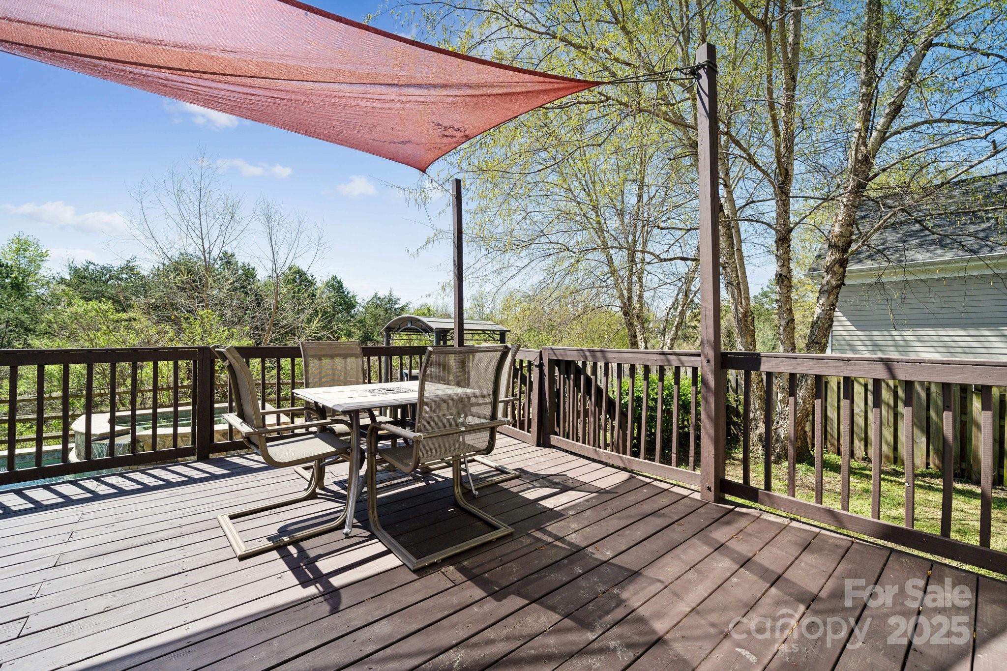369 Shoreline Parkway Tega Cay, SC 29708 - Photo 32 of 40 a view of balcony with wooden floor and outdoor seating