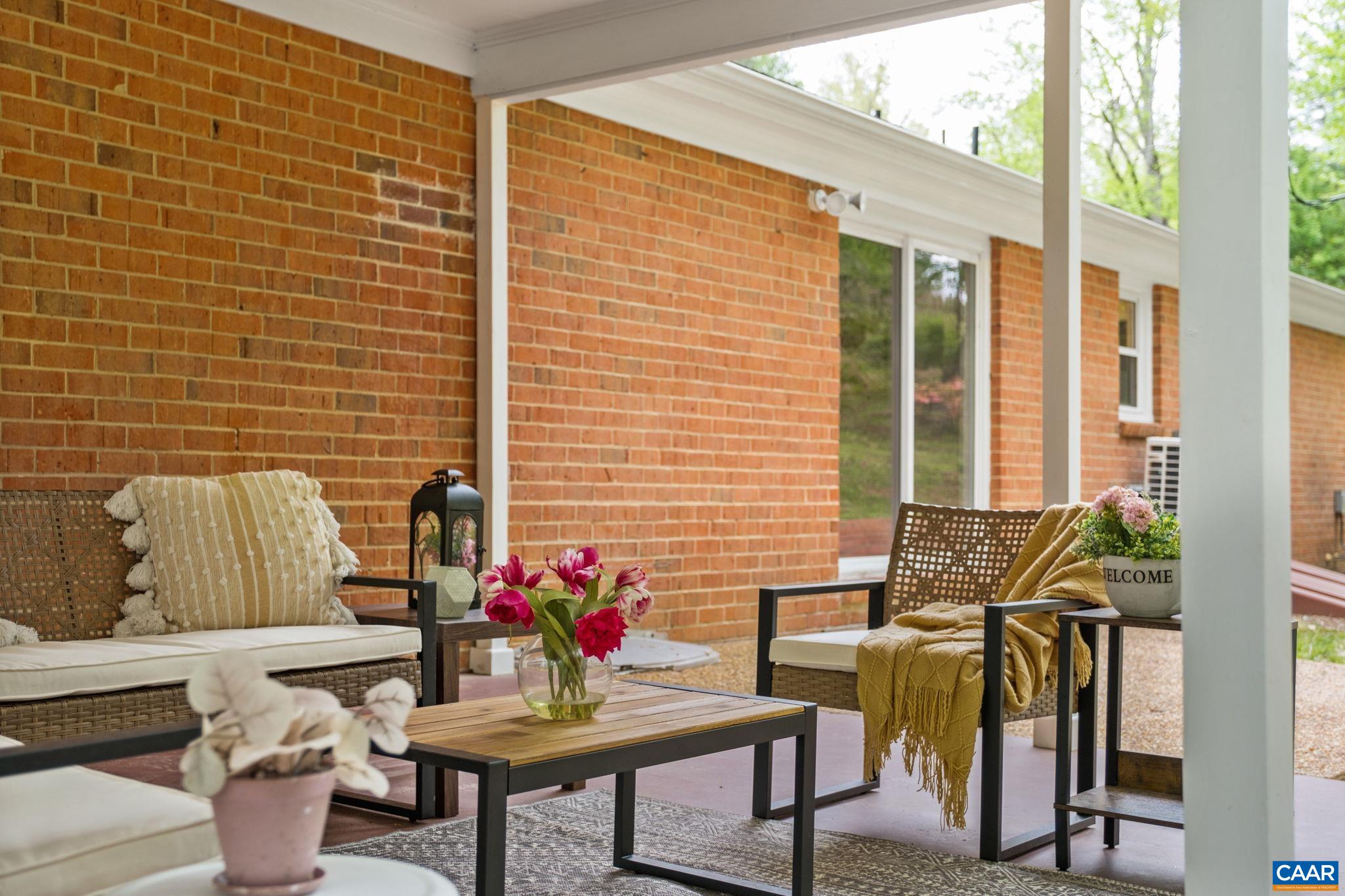 1680 Craigs Store Road Afton, VA 22920 - Photo 27 of 57 a view of a balcony with chairs and potted plants