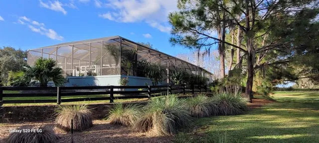 a view of a lake with a building in the background