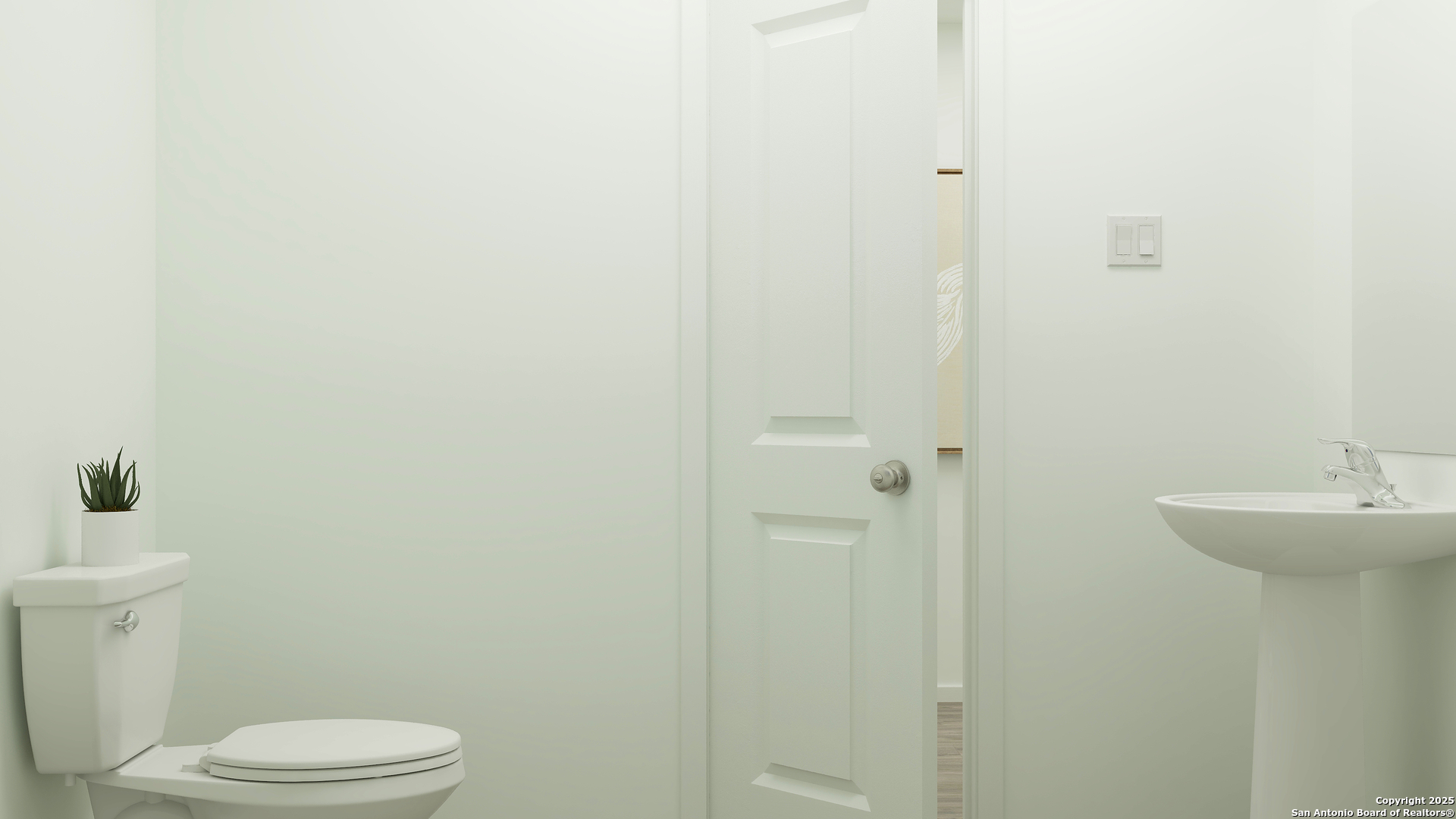 2938 Mancini Way Converse, TX 78109 - Photo 25 of 27 a bathroom with a sink a toilet and shower
