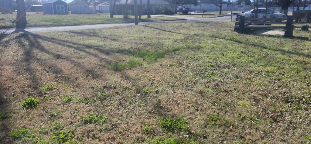 Tbd South Wilson Street Kaufman, TX 75142 - Photo 2 of 6 a view of a yard with wooden fence