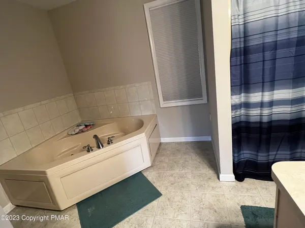a bathroom with a bathtub