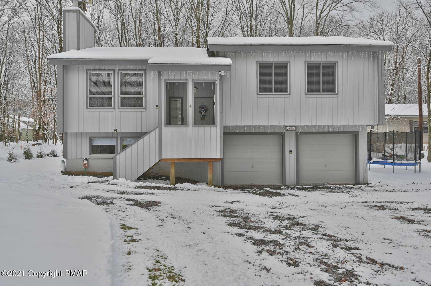 213 Boulder Road Lake Ariel, PA 18436 - Photo 2 of 78 a front view of a house with a yard