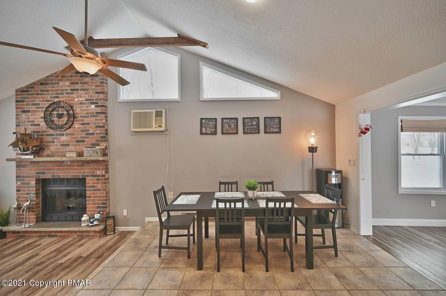 213 Boulder Road Lake Ariel, PA 18436 - Photo 28 of 78 a dining room with furniture and window