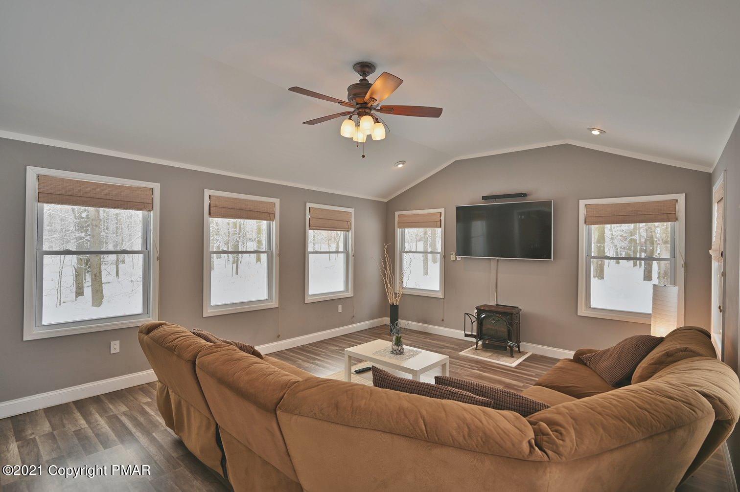 213 Boulder Road Lake Ariel, PA 18436 - Photo 30 of 78 a living room with furniture and a window
