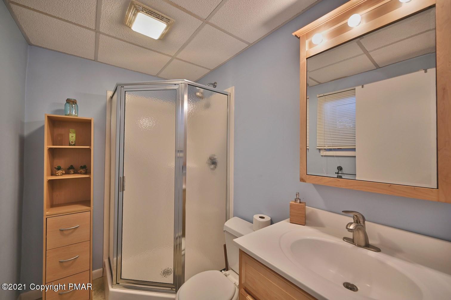 213 Boulder Road Lake Ariel, PA 18436 - Photo 55 of 78 a bathroom with a sink and mirror