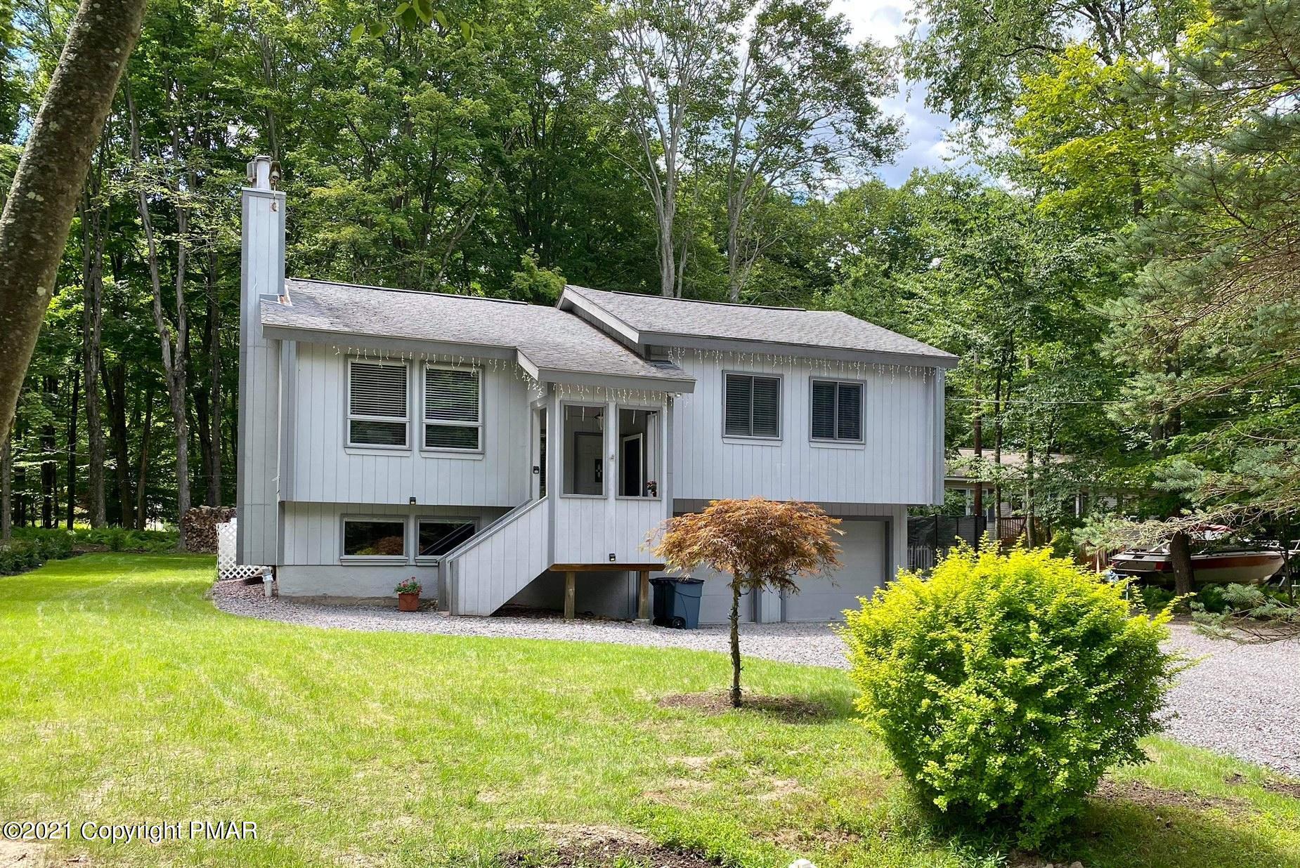 213 Boulder Road Lake Ariel, PA 18436 - Photo 62 of 78 a front view of house with yard and green space