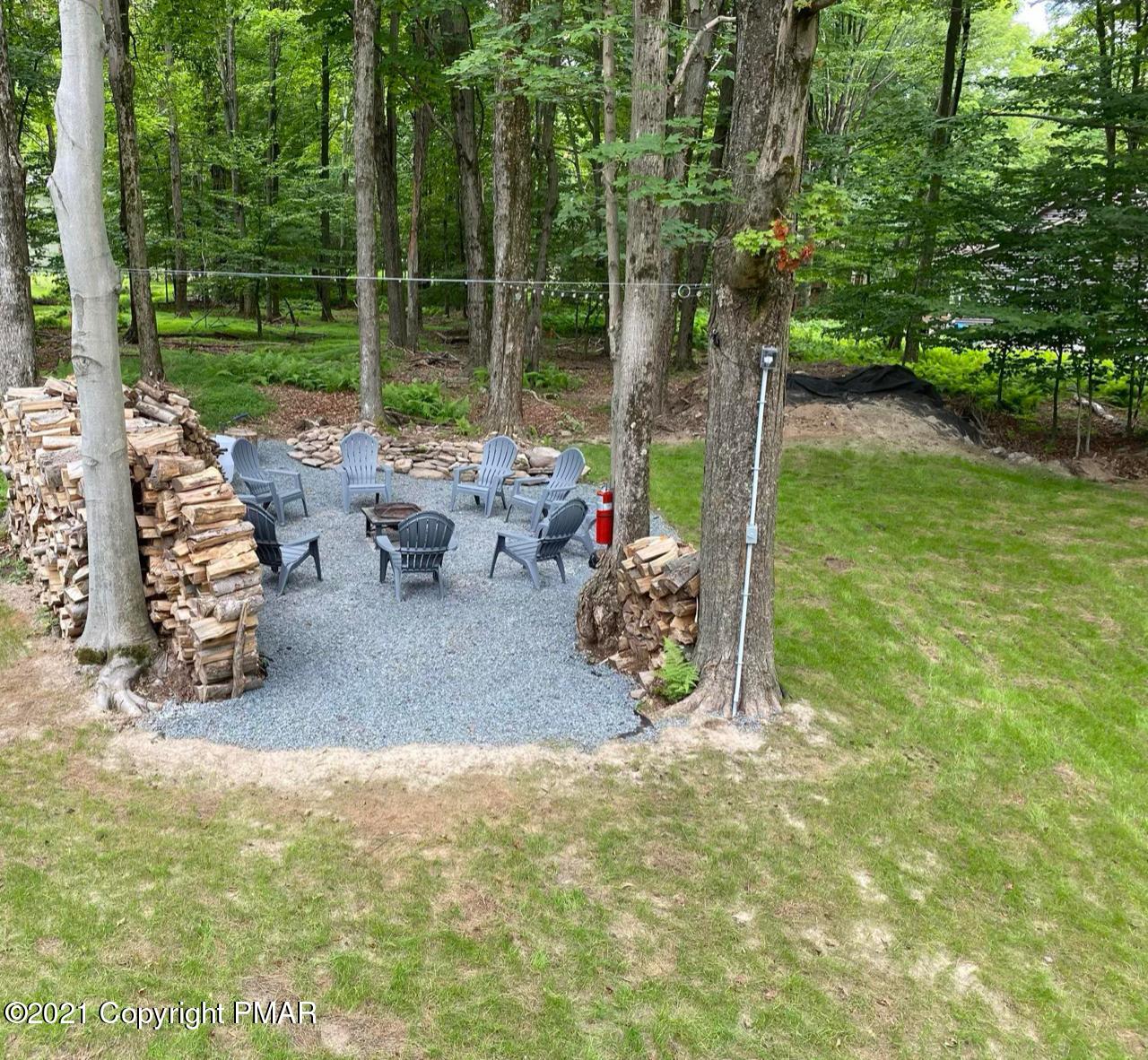 213 Boulder Road Lake Ariel, PA 18436 - Photo 65 of 78 a view of a table and chairs in the garden