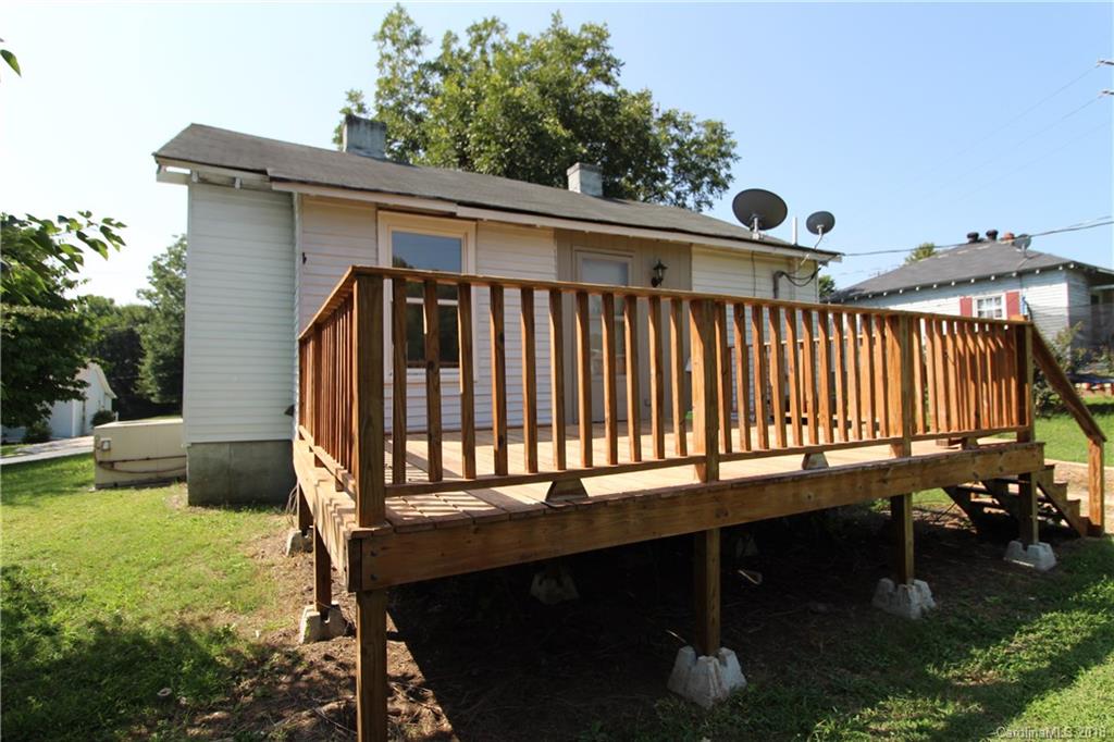 303 McConnell Street, Unit 71 Clover, SC 29710 - Photo 14 of 14 a balcony with table and chairs