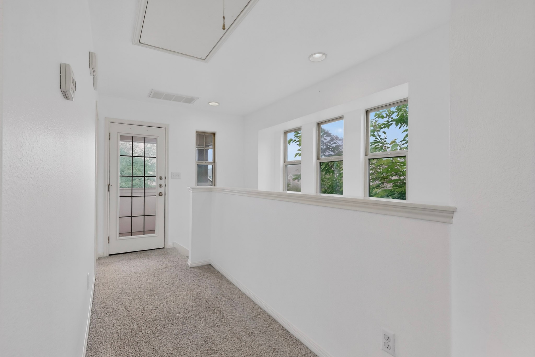4619 Inicio Lane Austin, TX 78725 - Photo 16 of 32 a view of an empty room with a window