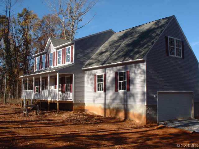 2092 Waltons Store Road Louisa, VA 23093 - Photo 1 of 1 a front view of a house with street