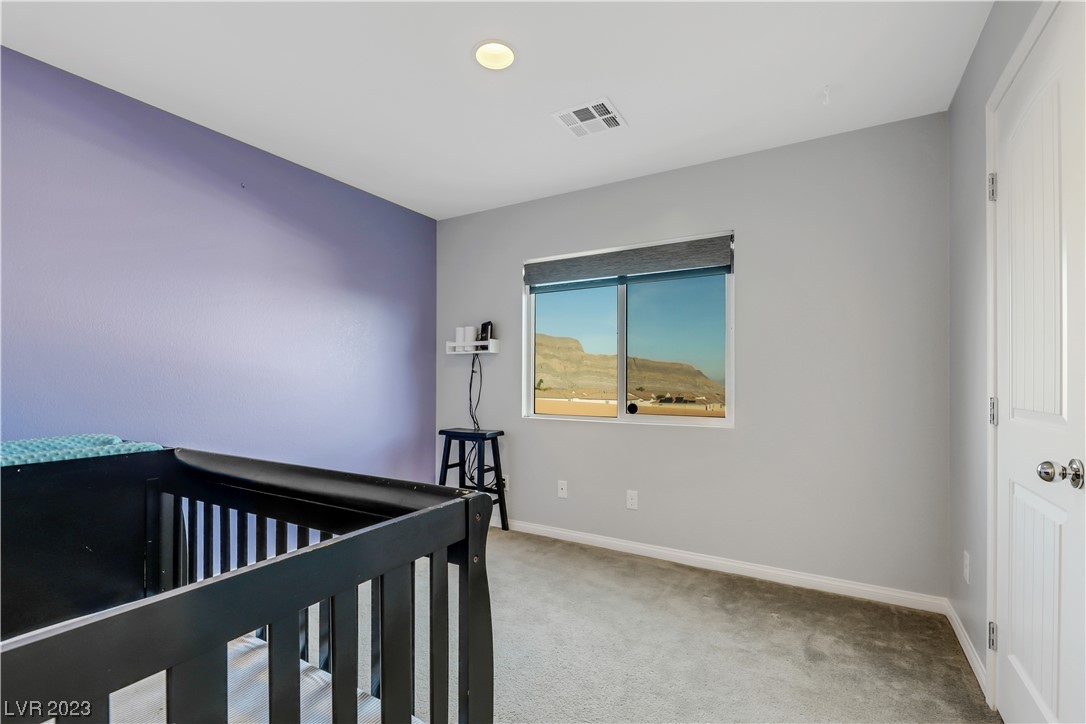 3928 Total Eclipse Street Las Vegas, NV 89129 - Photo 20 of 38 2nd floor bedroom with walk-in closet