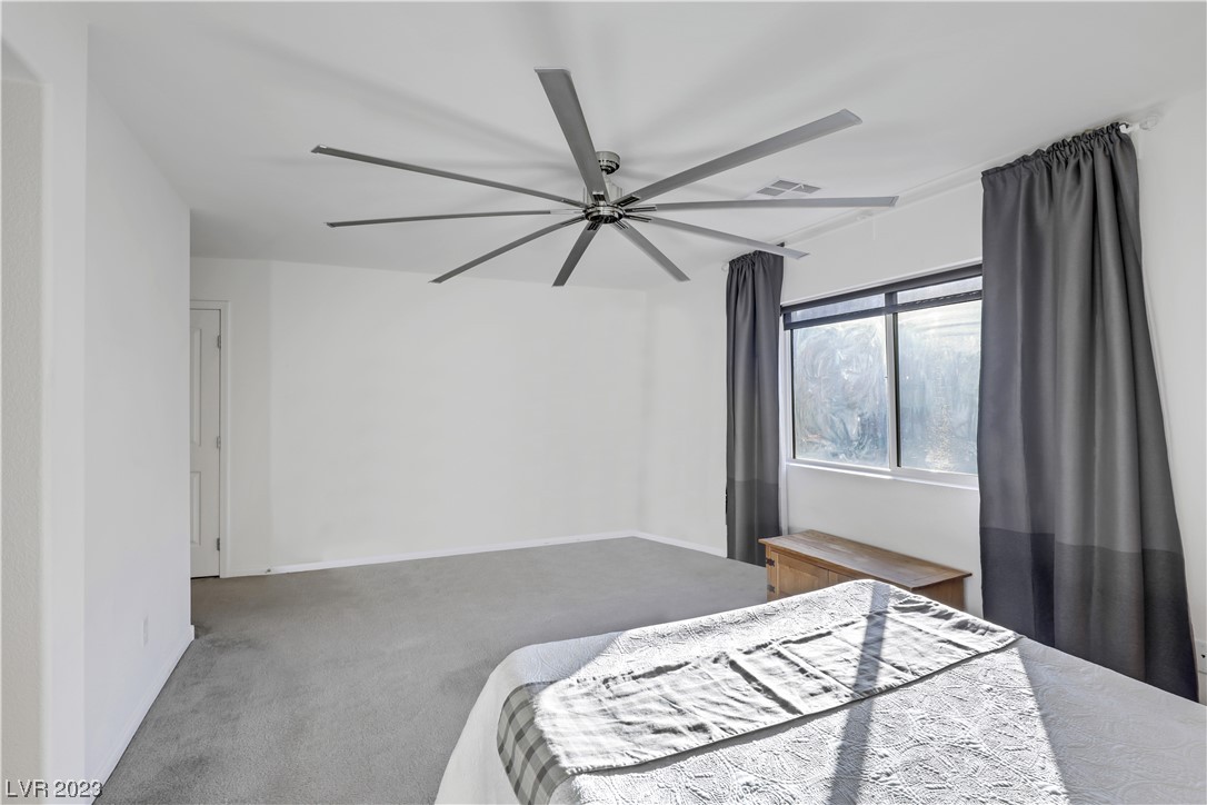 3928 Total Eclipse Street Las Vegas, NV 89129 - Photo 25 of 38 2nf floor primary bedroom