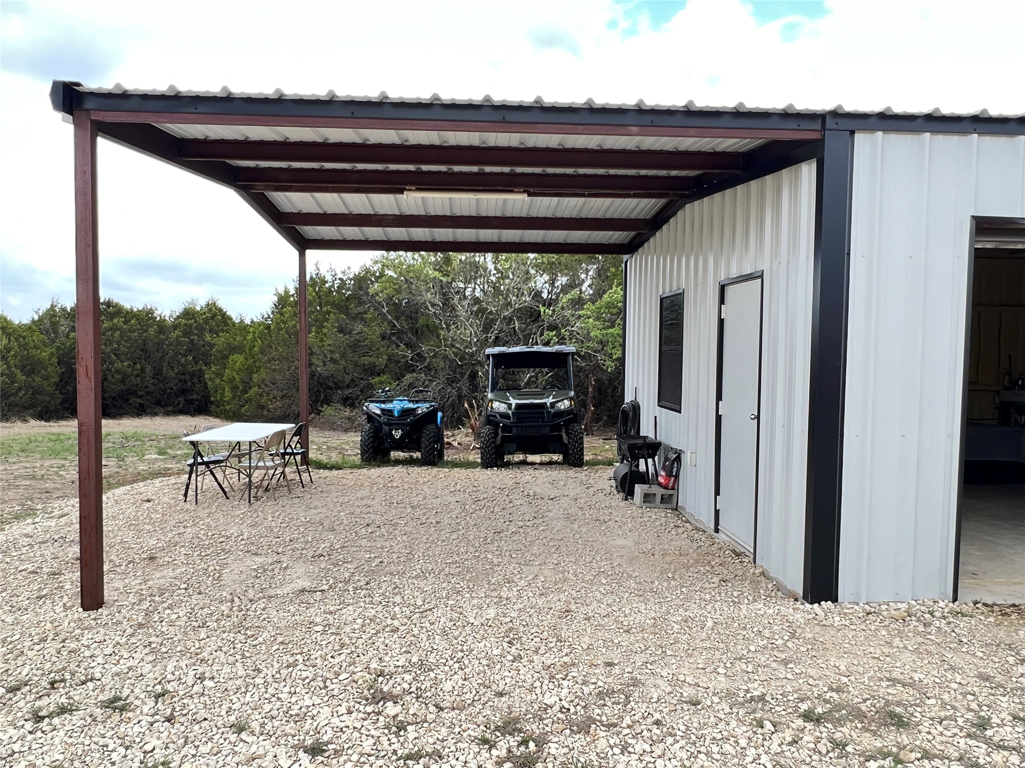 250 County Road 419 Evant, TX 76525 - Photo 2 of 14 a view of a porch with furniture and a yard