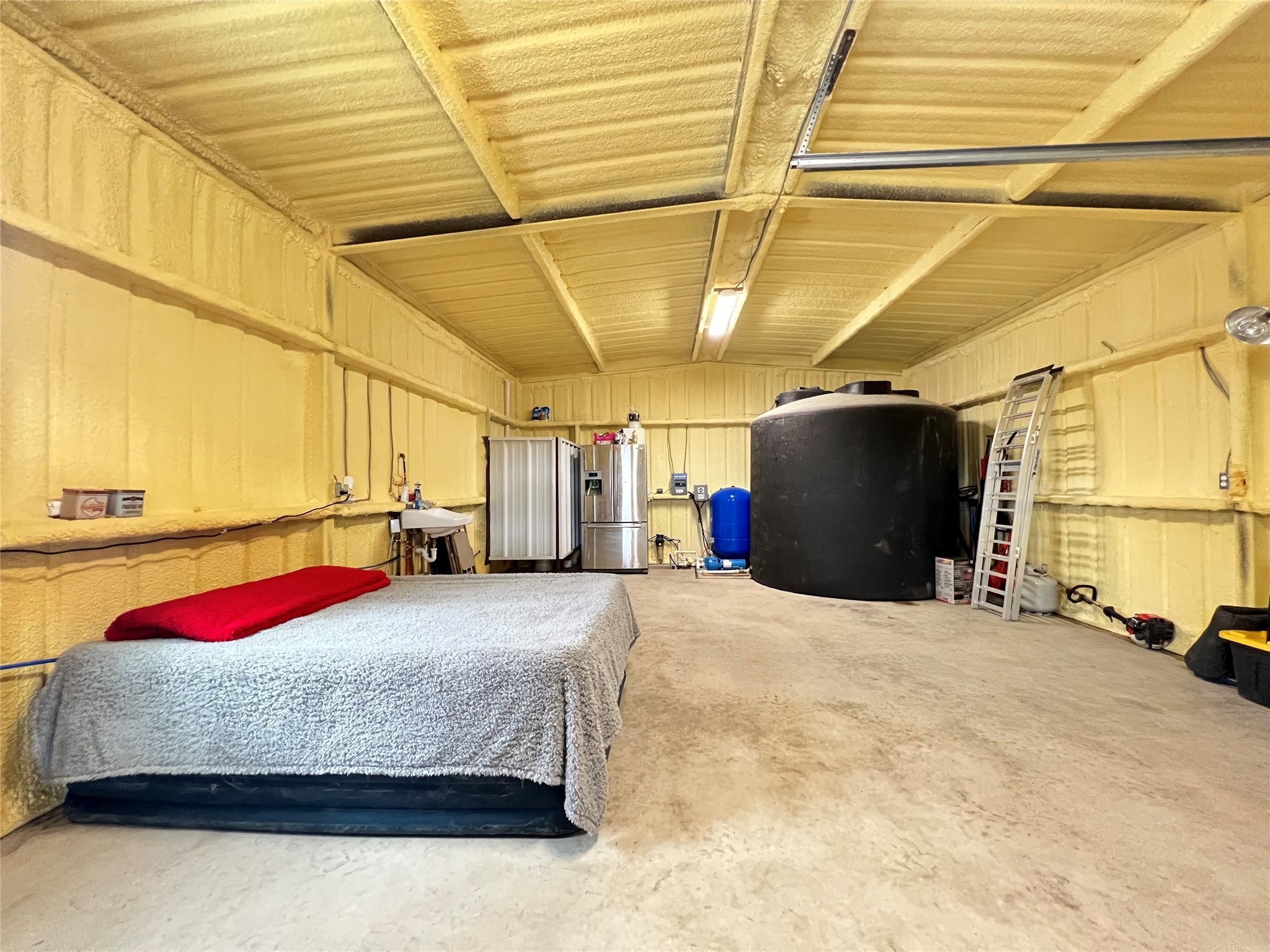 250 County Road 419 Evant, TX 76525 - Photo 9 of 14 a bedroom with bed and a window