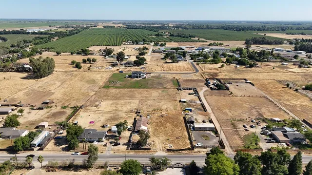 an aerial view of a building with outdoor space