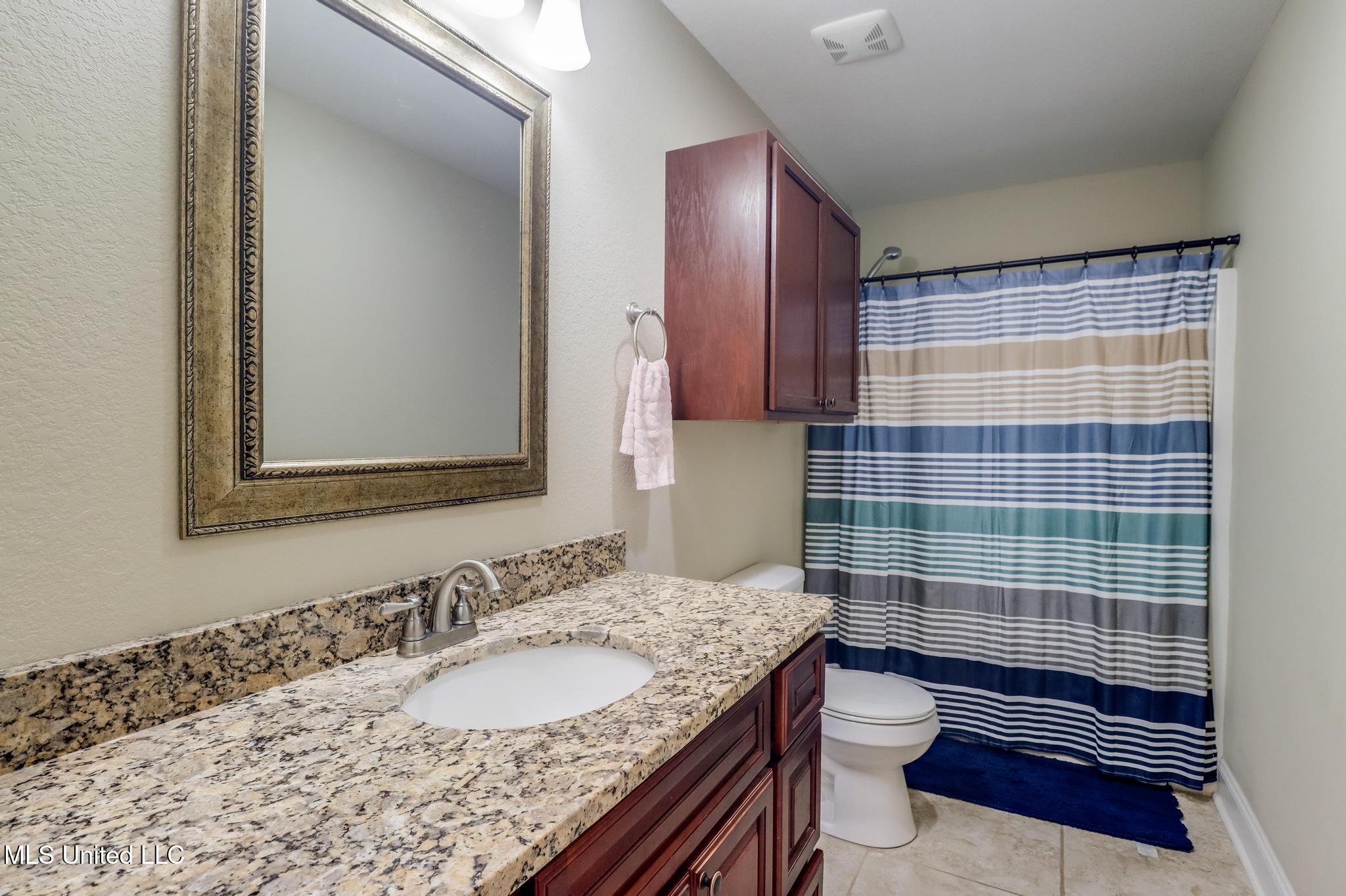 1061 East McHenry Road Perkinston, MS 39573 - Photo 14 of 28 Guest Bath