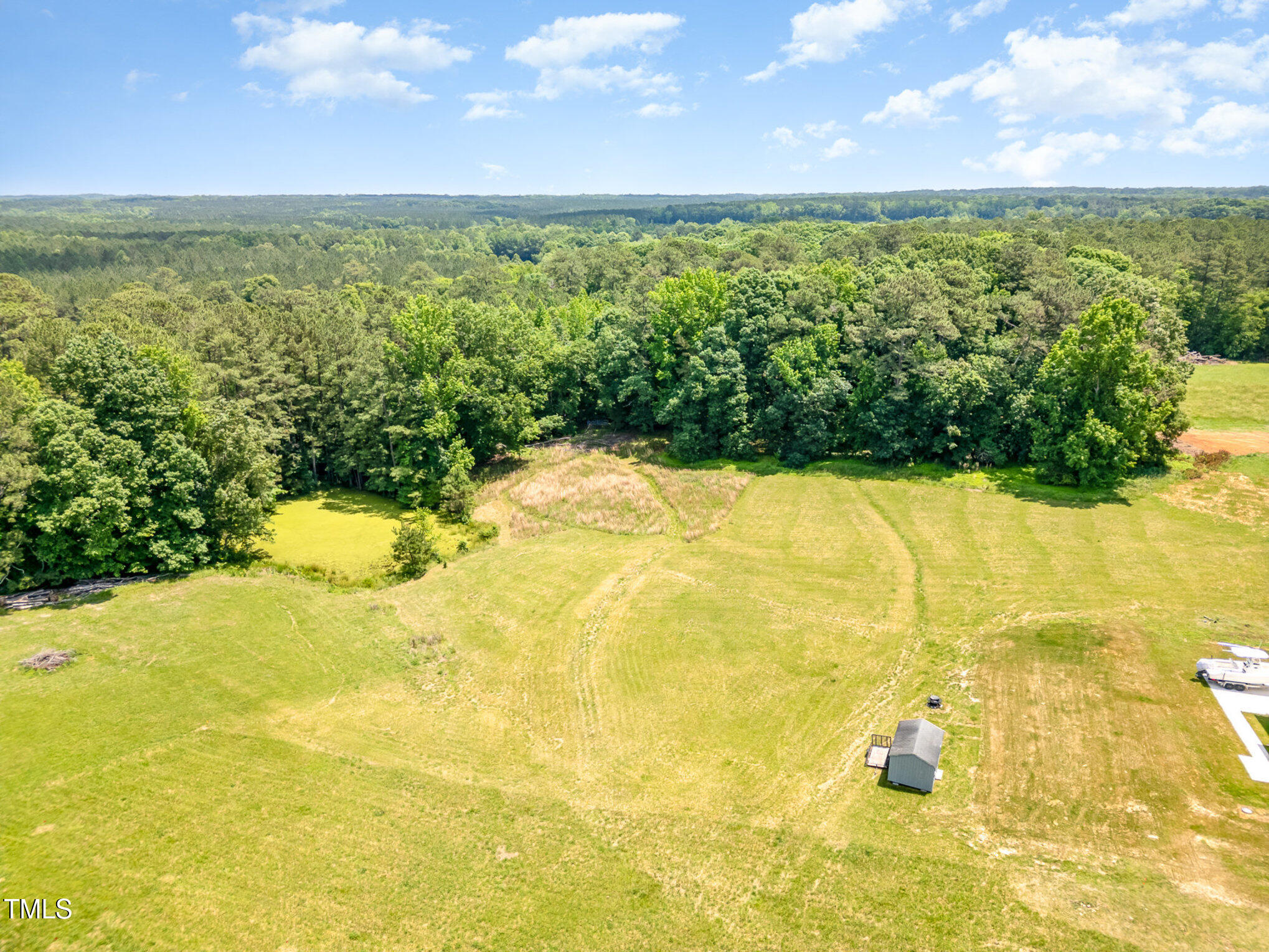 Lot 8 Stallings Road Spring Hope, NC 27882 - Photo 2 of 8 a view of an ocean from a yard