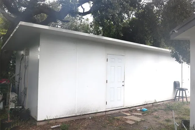 a house view with a backyard