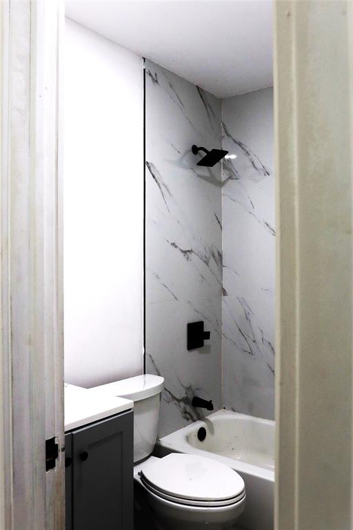 3075 Northwest 68th Street Miami, FL 33147 - Photo 8 of 24 a bathroom with a sink toilet and shower