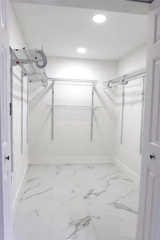 a view of a room with racks on the wall