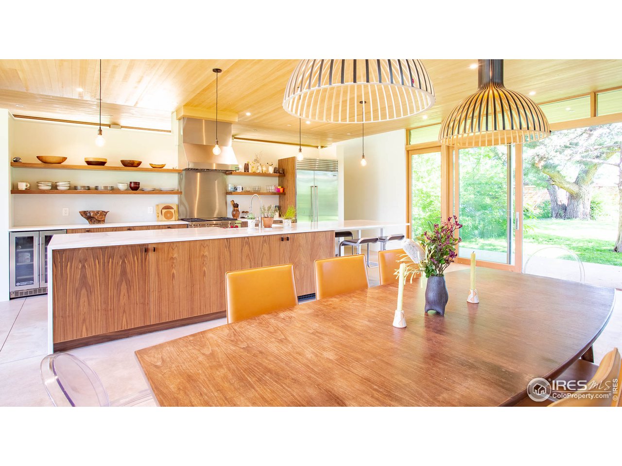 3074 15th Street Boulder, CO 80304 - Photo 18 of 40 a kitchen with a table and chairs